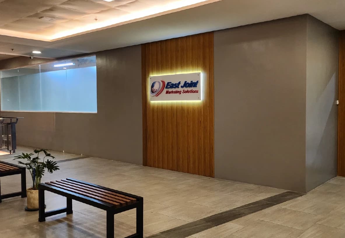 The East Joint Marketing Solutions office reception and branded signage
